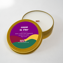Load image into Gallery viewer, Candle in a metallic tin with colorful label on a white background