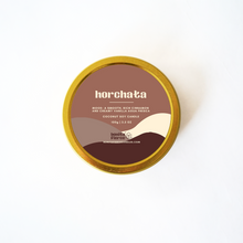 Load image into Gallery viewer, Horchata container with gold lid on a white background
