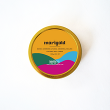Load image into Gallery viewer, Gold candle tin with colorful label on a white background
